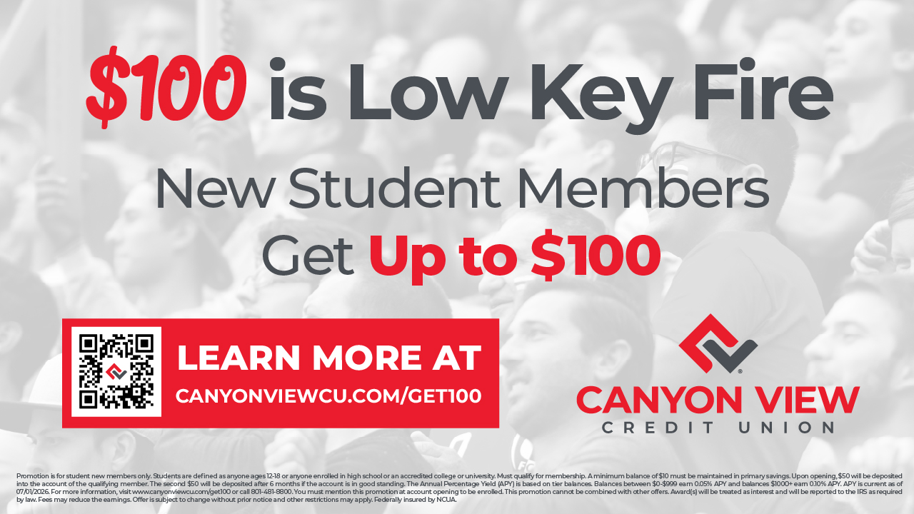 Landscape screen ad, 100 dollars is Low Key Fire, over a student crowd